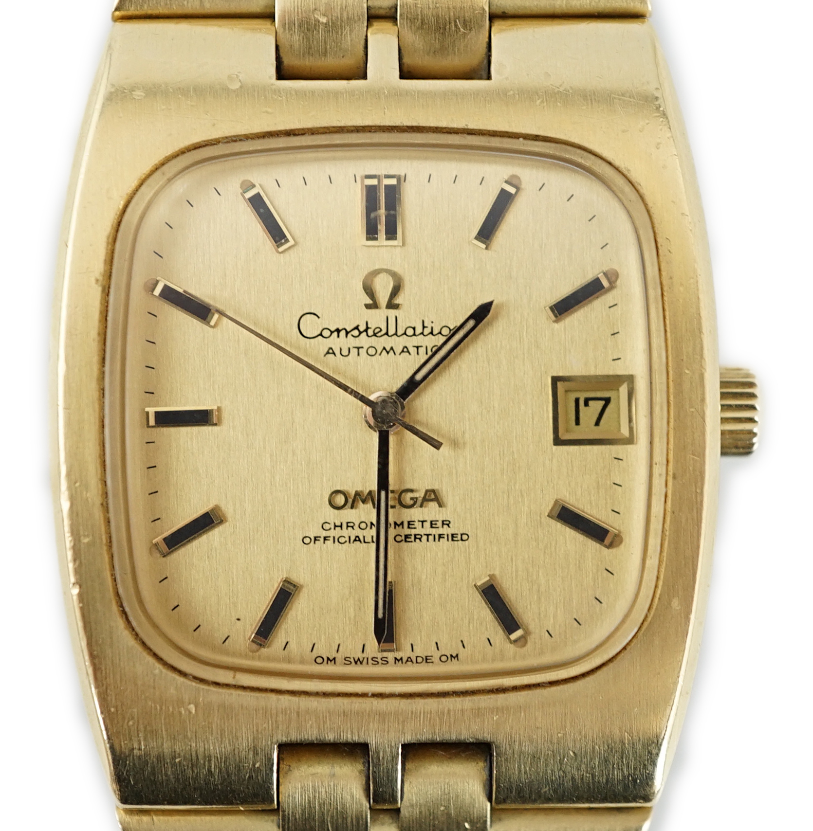 A gentleman's 1970's 18ct gold Omega Constellation automatic wrist watch, on an 18ct gold Omega bracelet